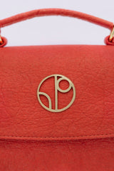 London Piñatex® Saddle Bag in Cherry Red